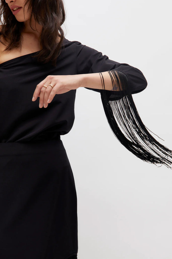 Asymmetrical top with black fringes
